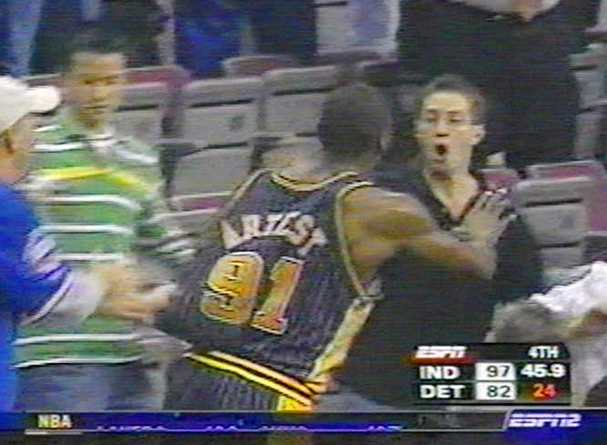 artest-91-seeks-retribution-against-a-fan-whom-he-believes-thew-an-open-container-of-alcohol-at-him-from-up-in-the-stand-unto-the-floor-during-the-game-played.jpg