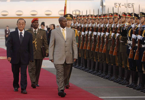  - ugandan-president-yoweri-museveni-inspects-a-guard-of-honor-upon-his-arrival-in-the-chinese-capitol-of-biejing