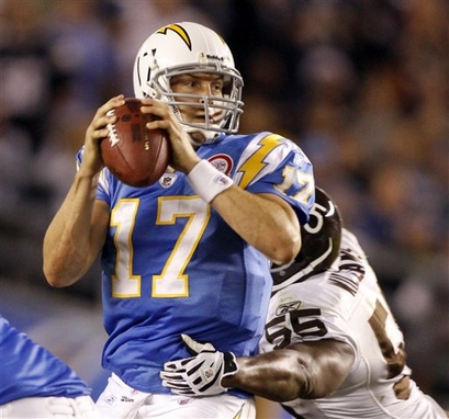 Chargers'  quarterback   Philip  Rivers (17)   is  about to  be  sacked  by  Broncos'  line  backer   D J Williams     in  last   night's  game   played   Qualcomm  Stadium  in  San  Diego   ,  California.   The  Chargers   would   go  on  to  lose  the  game  to  the  Broncos  34-23   ,  with  the  Broncos  remaining  unbeaten  within  the  league.       picture  appears  courtesy of   ap/photo/  Denis  Poroy   .................. 