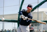 Minnesota Twins pitcher Joe Mauer swings in the batting cage at baseball spring training in Fort Myers, Fla., Thursday, Feb. 25, 2010. photo appears courtesy of Assoc Press/ Nati Harnik .......