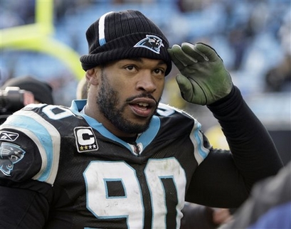 Carolina Panthers' Julius Peppers saluting fans as he walks off the field after the Panthers' <strong> 23-10 </strong>win over the New Orleans Saints in an NFL football game in Charlotte, N.C. The Panthers have decided the price is too steep to keep their all-time sacks leader. It means five-time Pro Bowl defensive end Julius Peppers is about to become one of the top prizes in free agency.  Agent Carl Carey says the Panthers have told him they won't place the restrictive franchise tag on Peppers for a second consecutive year at a cost of more than $20 million.  The move Tuesday, Feb. 23, 2010,  comes two days before the tag deadline.  photo appears courtesy  of Associated  Press/ Rick Havner  ......