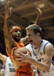 Duke's Jon Scheyer collides with Virginia Tech's Malcolm Delaney, left, during the first half. Scheyer scored 25 points and collected 10 rebounds in the win.