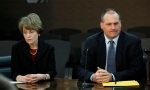 University of Michigan President Mary Sue Coleman, left, and head football coach Rich Rodriguez, right, are shown at a news conference in Ann Arbor, Mich., Tuesday, Feb. 23, 2010. The NCAA has found that Michigan's storied football program was out of compliance with practice time rules under coach Rodriguez. Incoming athletic director David Brandon disclosed the finding Tuesday. He says there were no surprises in the NCAA findings. He also says Rodriguez remains the coach. Michigan has 90 days to respond and will appear at an NCAA hearing on infractions in August. photo appears courtesy of Associated Press/ Paul Sancya ......