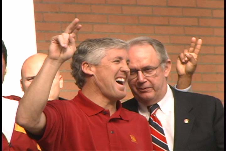 Former Trojans' football head coach Pete Carroll is seen here alongside University President Steven B Sample. The university President is set to vacate his position later on this year. The are now calls for the AD Mike Garrett to do likewise. photo appears courtesy of upi.com/ Roland Sharvelle ............