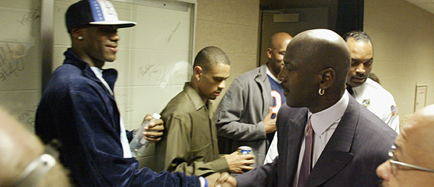 High schooler LeBron James meets Michael Jordan after a game in 2003. NBAE/ Getty Images/ David Liam Kyle ............