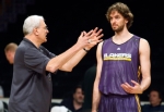 Coach Phil Jackson and Pau Gasol talk during a Los Angeles Lakers practice session as they prepare to meet the Boston Celtics in Game 7 of the NBA basketball Finals, at Staples Center in Los Angeles Wednesday, June 16, 2010. (AP Photo/Reed Saxon)