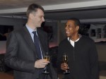 Mikhail Prokhorov (left) the majority stakeholder and owner of the New Jersey Nets is seen here with minority investor and stakeholder in the team _ rapper Jay Z. The two are hoping for renewed success for the franchise. Prokhorov has stated that it is his intention to make the NBA franchise a worldwide success on a global scale . His plan is to make the team a perennial contender with the hope of winning an NBA title within the next five years. Getty Images/ Fernando Jiminez