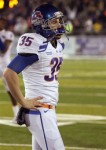 Boise State Broncos kicker Kyle Brotzman walks back to the sidelines after missing a field goal in overtime against Nevada during the NCAA college football game Friday night, Nov. 26, 2010, in Reno, Nev. Nevada won the game 34-31 . _____ AP Photo/Cathleen Allison ..........