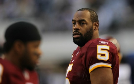 Quarterback Donovan McNabb (5) of the Washington Redskins on the sidelines against play against the Dallas Cowboys at Cowboys Stadium on December 19, 2010 in Arlington, Texas. Photo by Ronald Martinez/Getty Images ...............