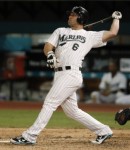 In this Sept. 18, 2010, photo, Florida Marlins' Dan Uggla bats in a baseball game against the Chicago Cubs in Miami. Uggla has been traded from the Marlins to the Atlanta Braves for infielder Omar Infante and left-hander Mike Dunn. (AP Photo/Alan Diaz)