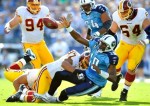 Lorenzo Alexander (97) of the Washington Redskins forces a fumble by quarterback Vince Young (10) of the Tennessee Titans during the first half at LP Field on November 21, 2010 in Nashville, Tennessee. (Photo by Grant Halverson/Getty Images ........